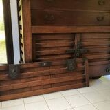 Japanese antique wooden chest with black fittings.