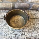Basin cauldron or old garden in yellow copper