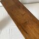 Low stool in varnished wood