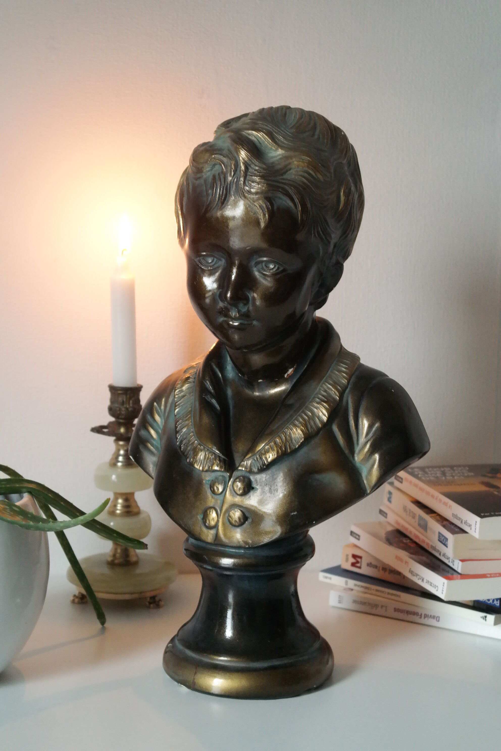 Buste en plâtre garçon patine bronze XXème