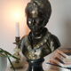 Buste en plâtre garçon patine bronze XXème