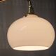 Brass and opaline gooseneck wall lamp – early twentieth century