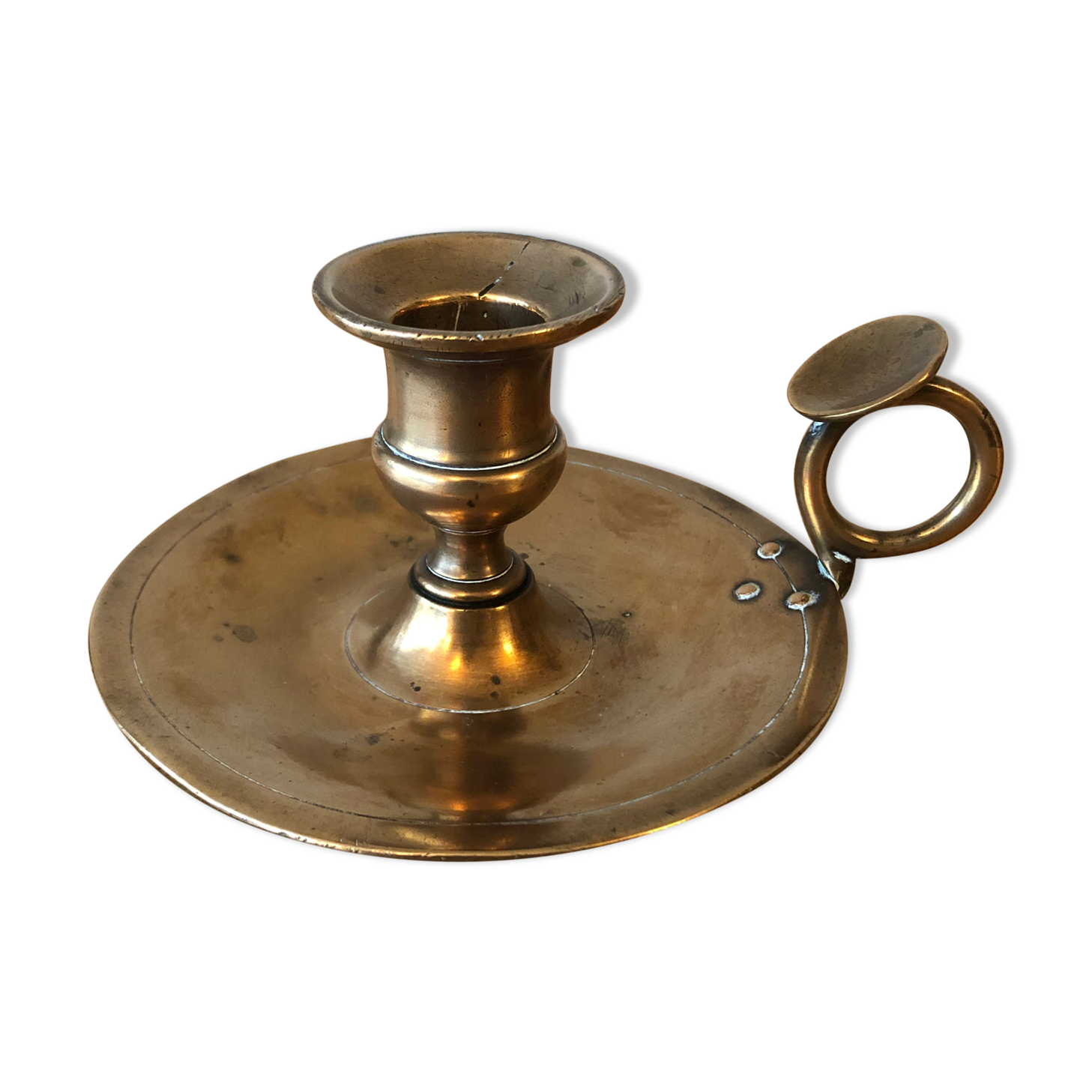 Old copper hand-held candlestick