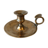 Old copper hand-held candlestick