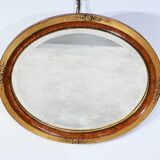 Miroir ovale en bois doré – début XXe