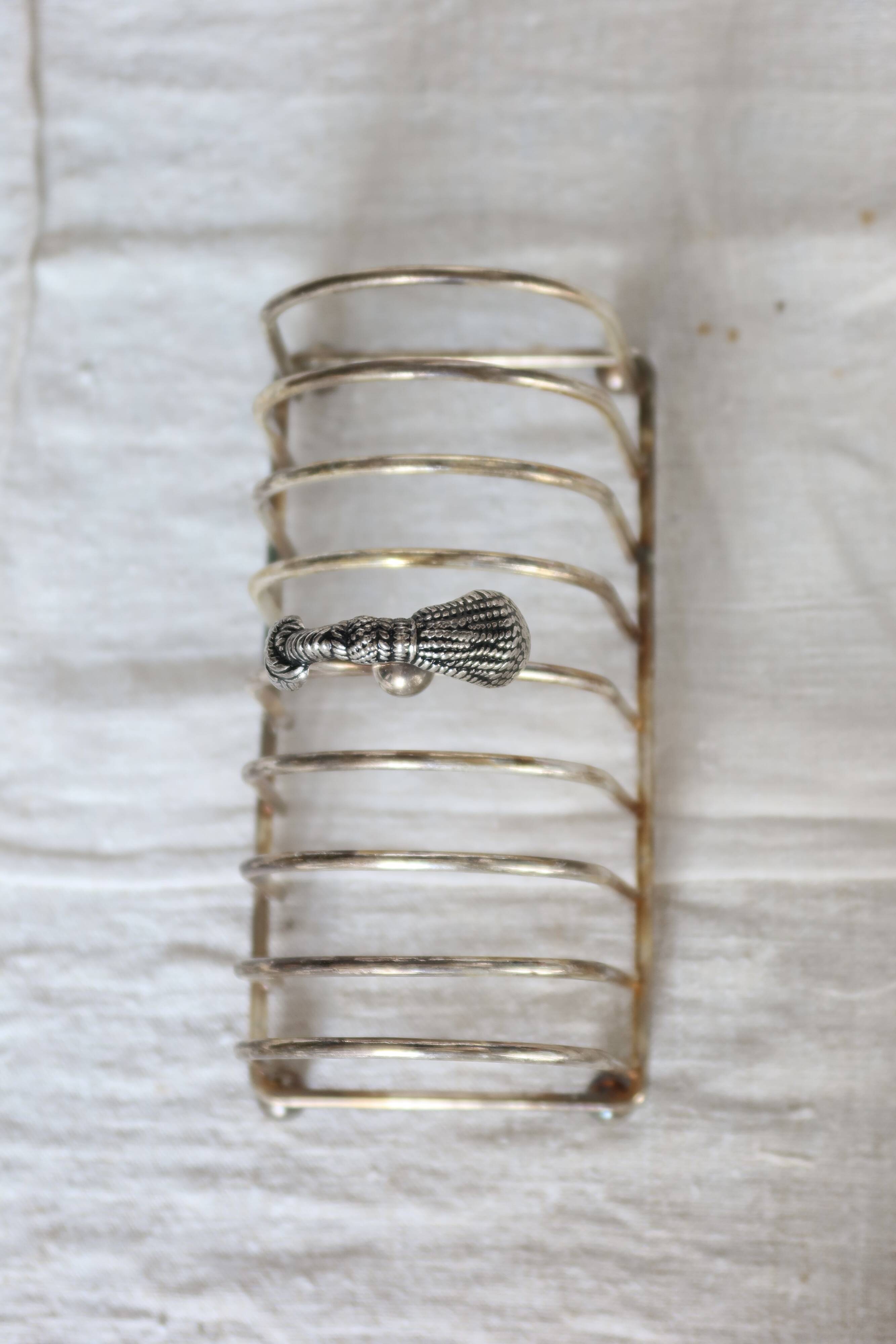 Large vintage silver metal toast rack - Curtain bow detail