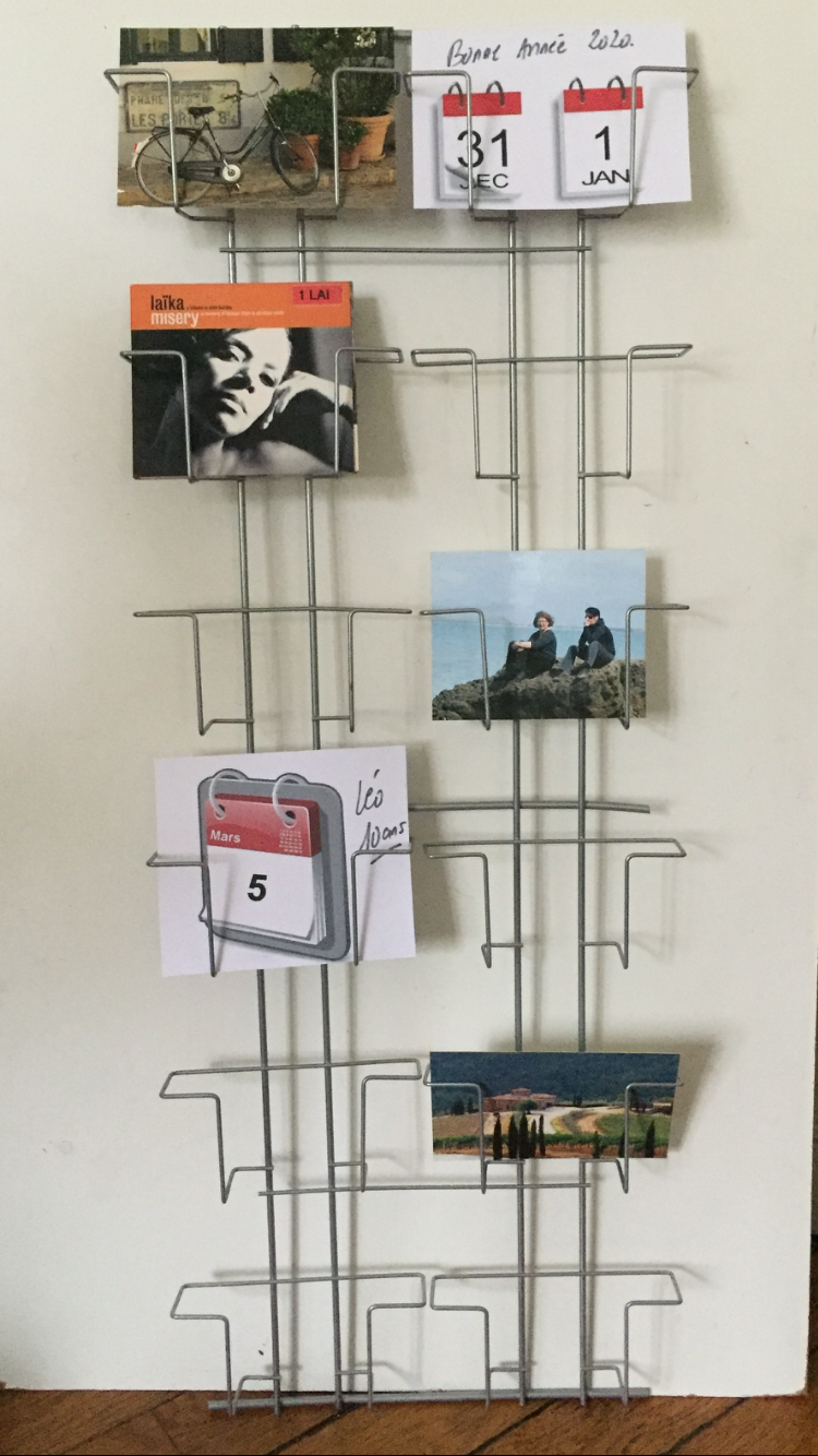 Double display for postcards, photos, books and CDs