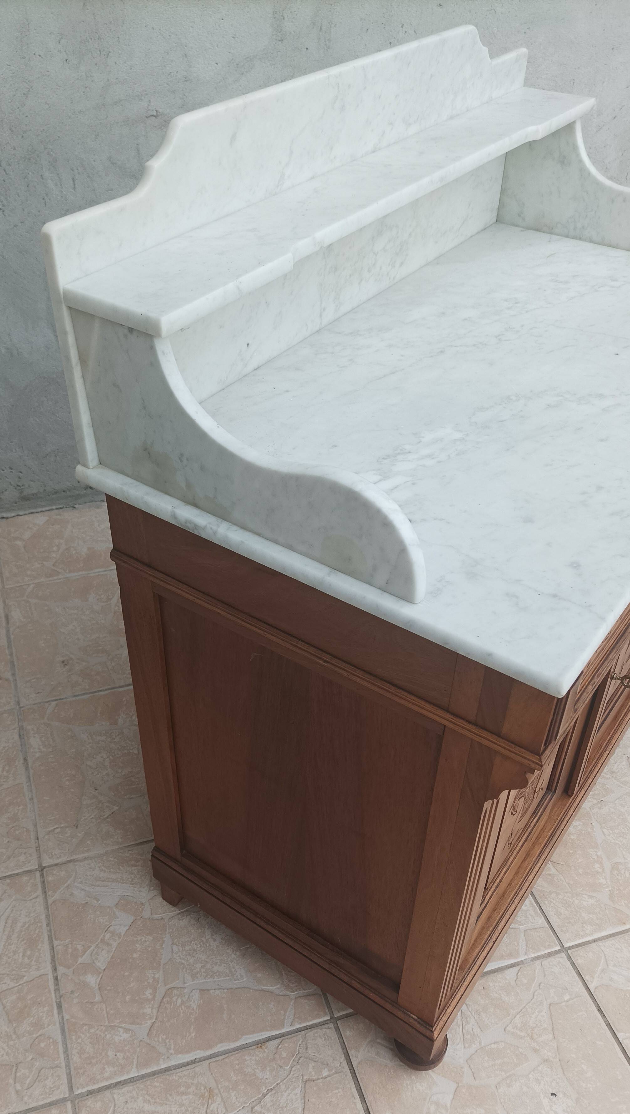 Antique walnut and white marble bathroom cabinet