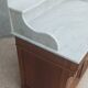Antique walnut and white marble bathroom cabinet