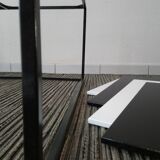 Square coffee table has checkered 80s