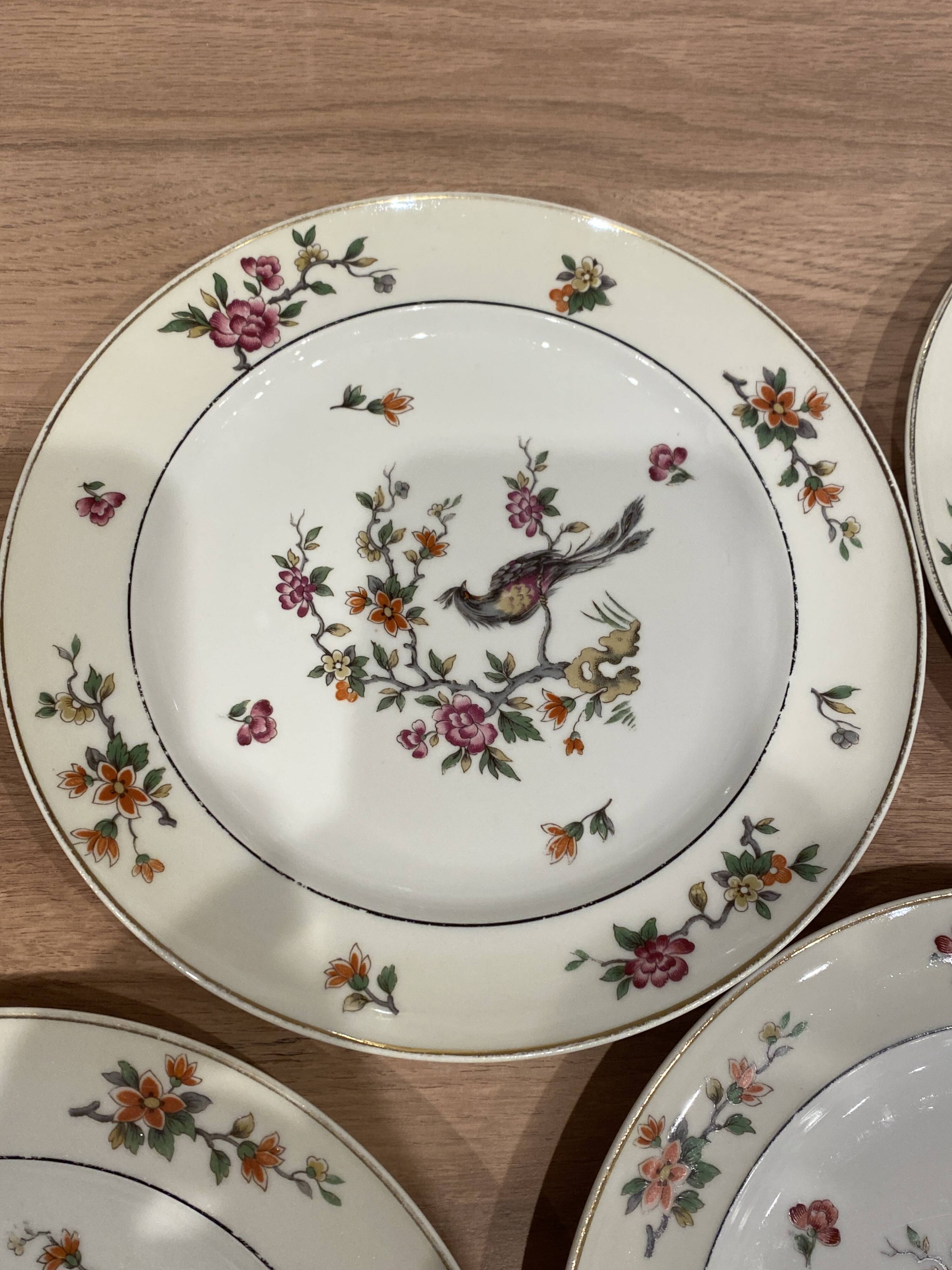 Set of 8 flat plates in Limoges porcelain