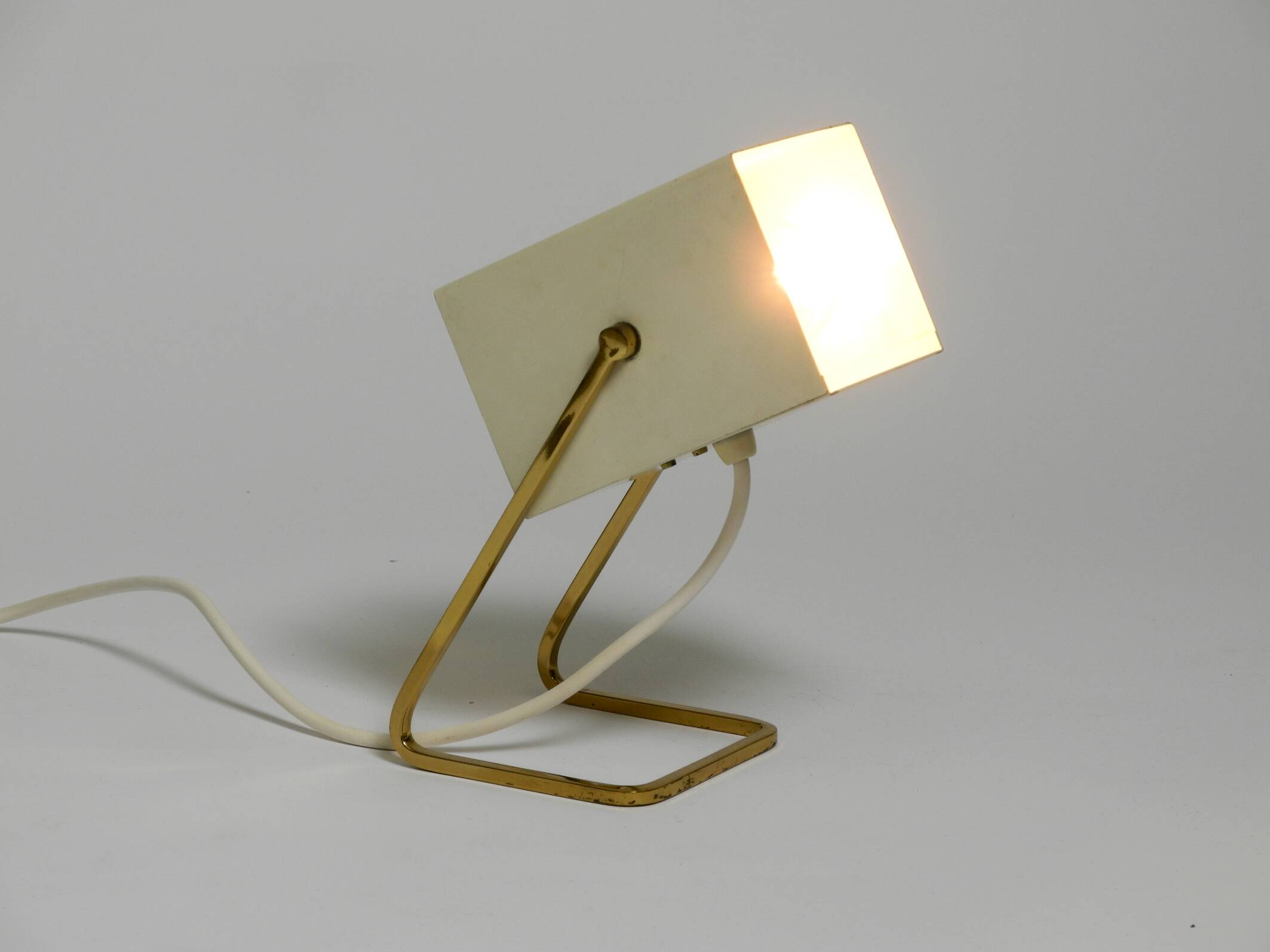 Great Mid Century metal bedside lamp with brass base by Kaiser Leuchten