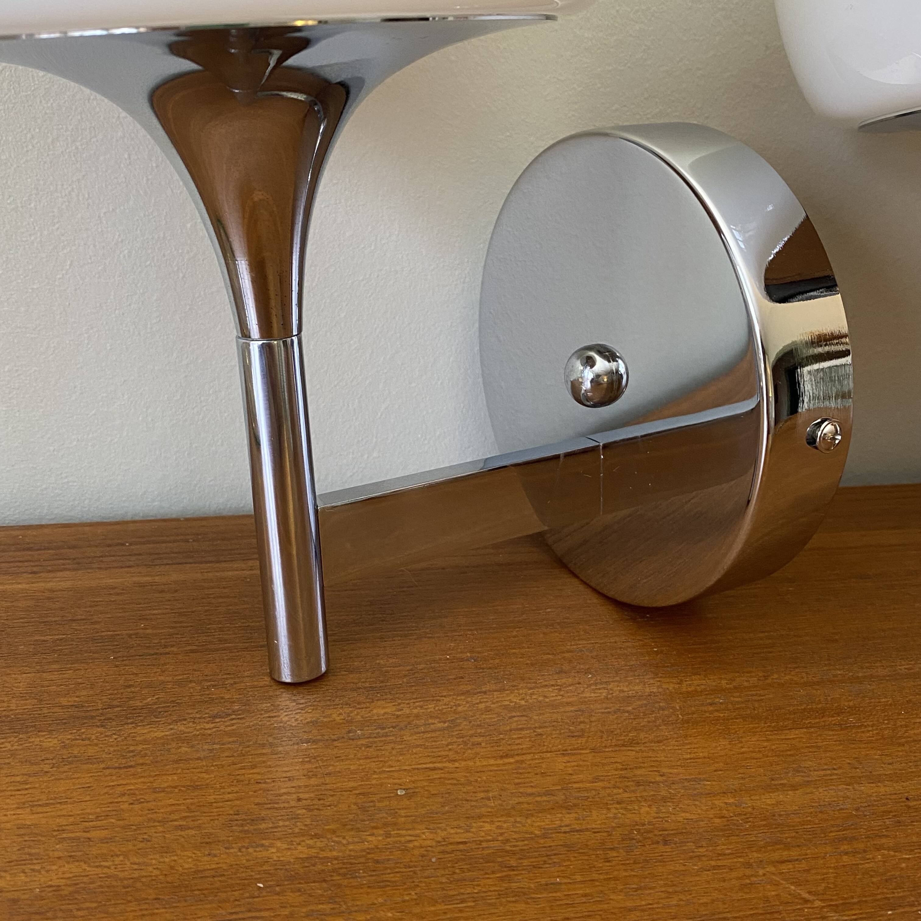 Pair of seventies wall sconces with chrome metal and opaline glass globe.