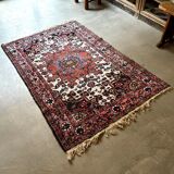 Persian carpet in wool and silk, old rose.