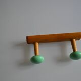 Wall coat rack with 2 hooks, wood and plastic, 60s style.