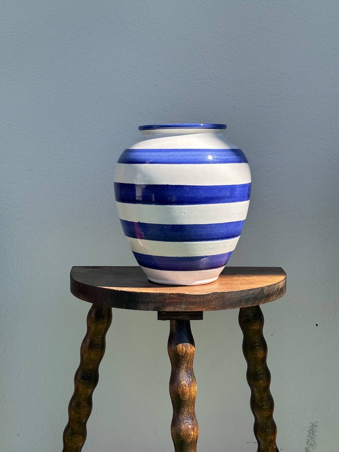 Blue striped ceramic vase