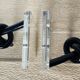 Bookends in plexiglass and knotted black tubes, 1980s design.
