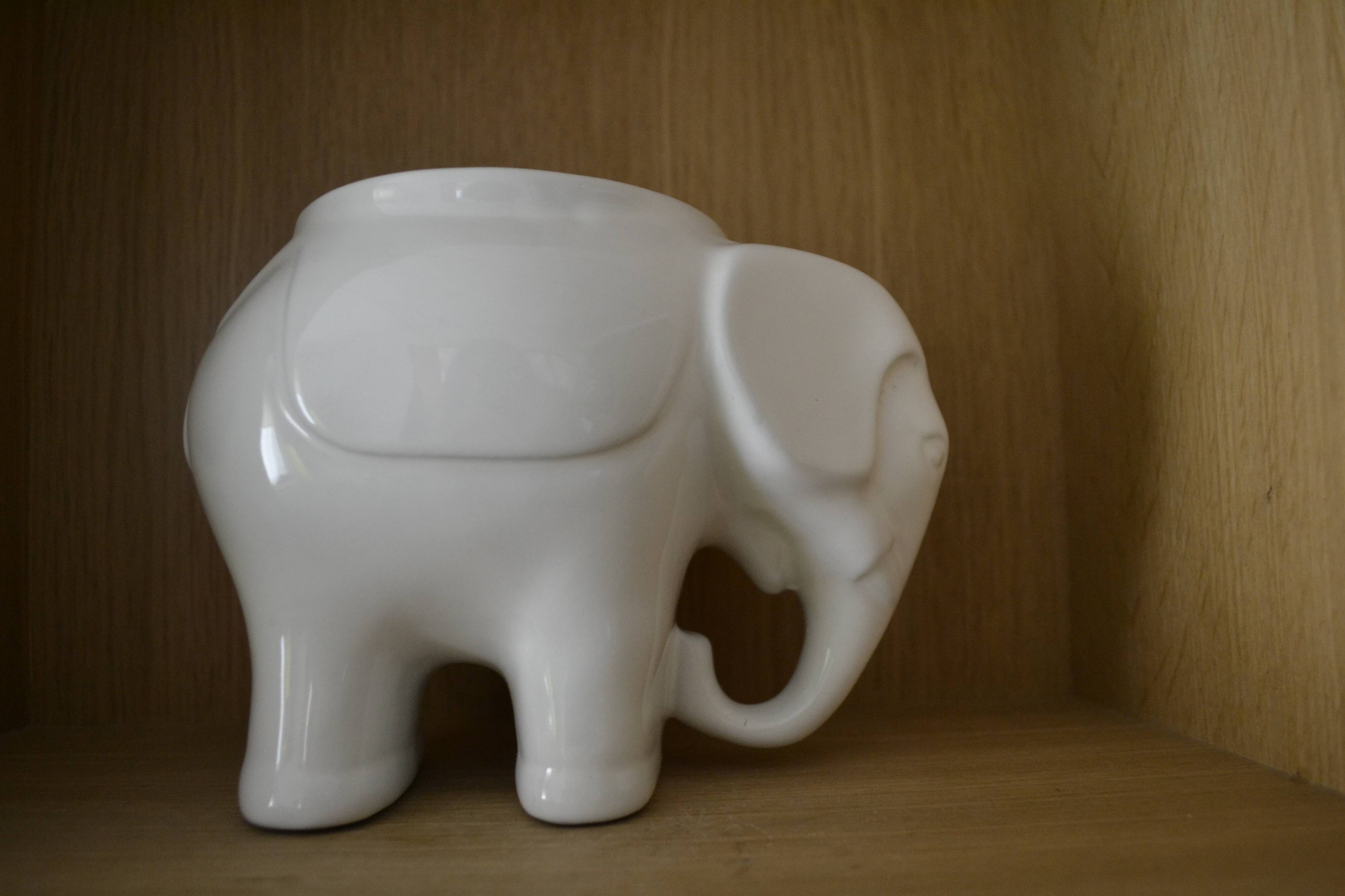 White elephant pot cover