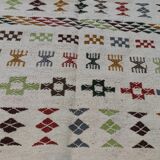 Handmade rugs in natural wool with traditional patterns