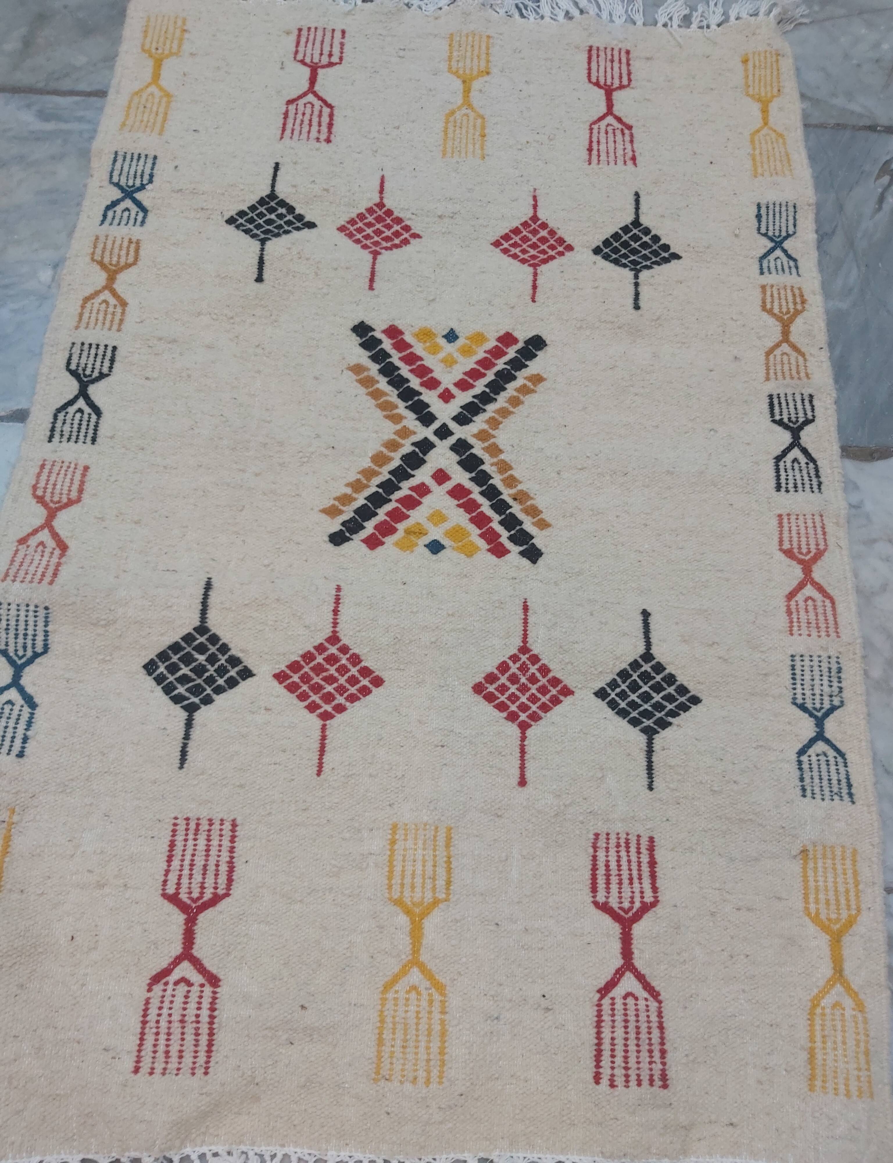 Traditional handmade carpet 112x72cm