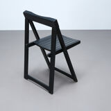 Set of three black folding chairs circa 1980