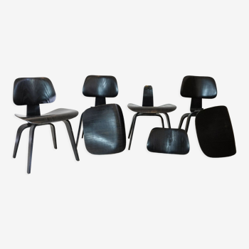 Set of 4 DCW chairs by Charles & ray Eames