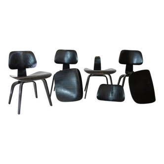 Set of 4 DCW chairs by Charles & ray Eames