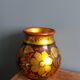Khokhloma vase, Russian lacquered wood craftsmanship, hand-painted floral decoration.