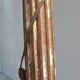 Large antique church candlestick in carved wood transformed into a lamp.