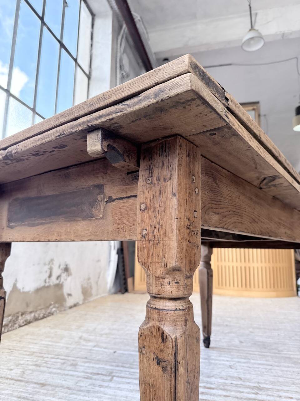 Solid oak farmhouse table with integrated extensions 1950