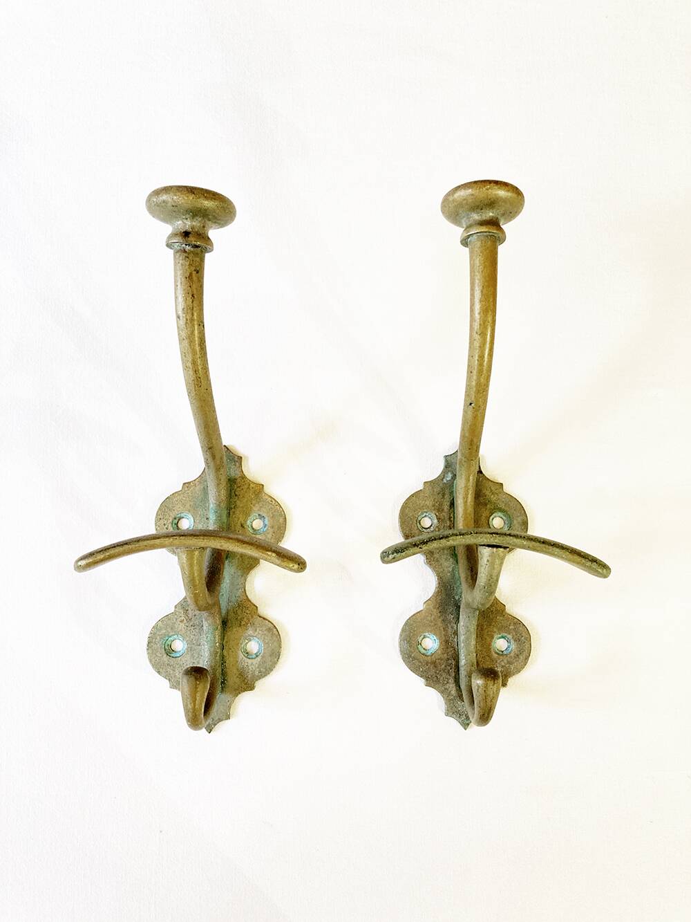 Antique patinated brass coat hooks