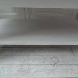 Coffee table with pearl gray patinated base, belt and shelf, wooden top.