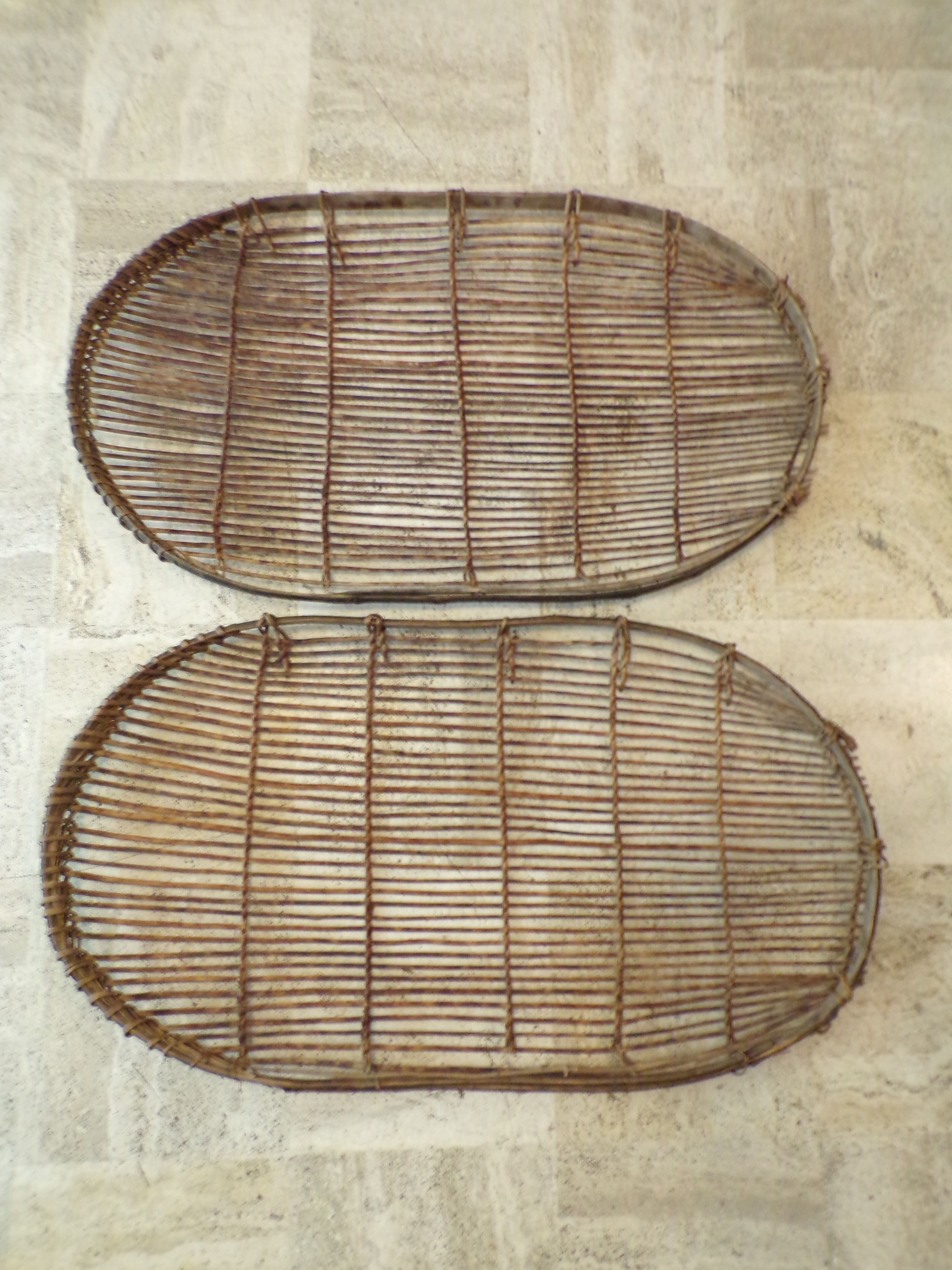Duo of old wicker racks
