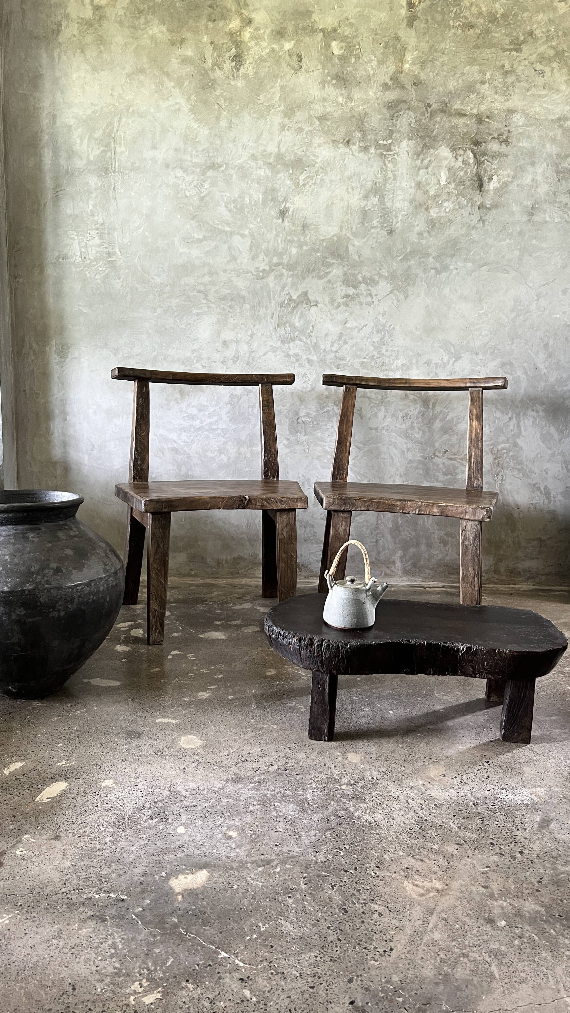 Small old Asian wooden coffee table in Japanese style, kidney-shaped top