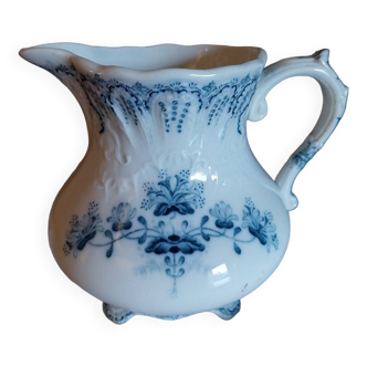 Iron earth milk jug, stamped St Amand Regency model