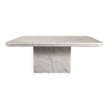 Table with a solid Carrara marble base.