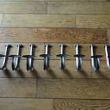 Set 8 vintage school hooks