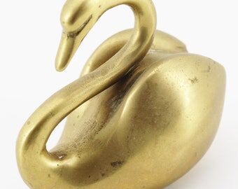 Brass swan statue