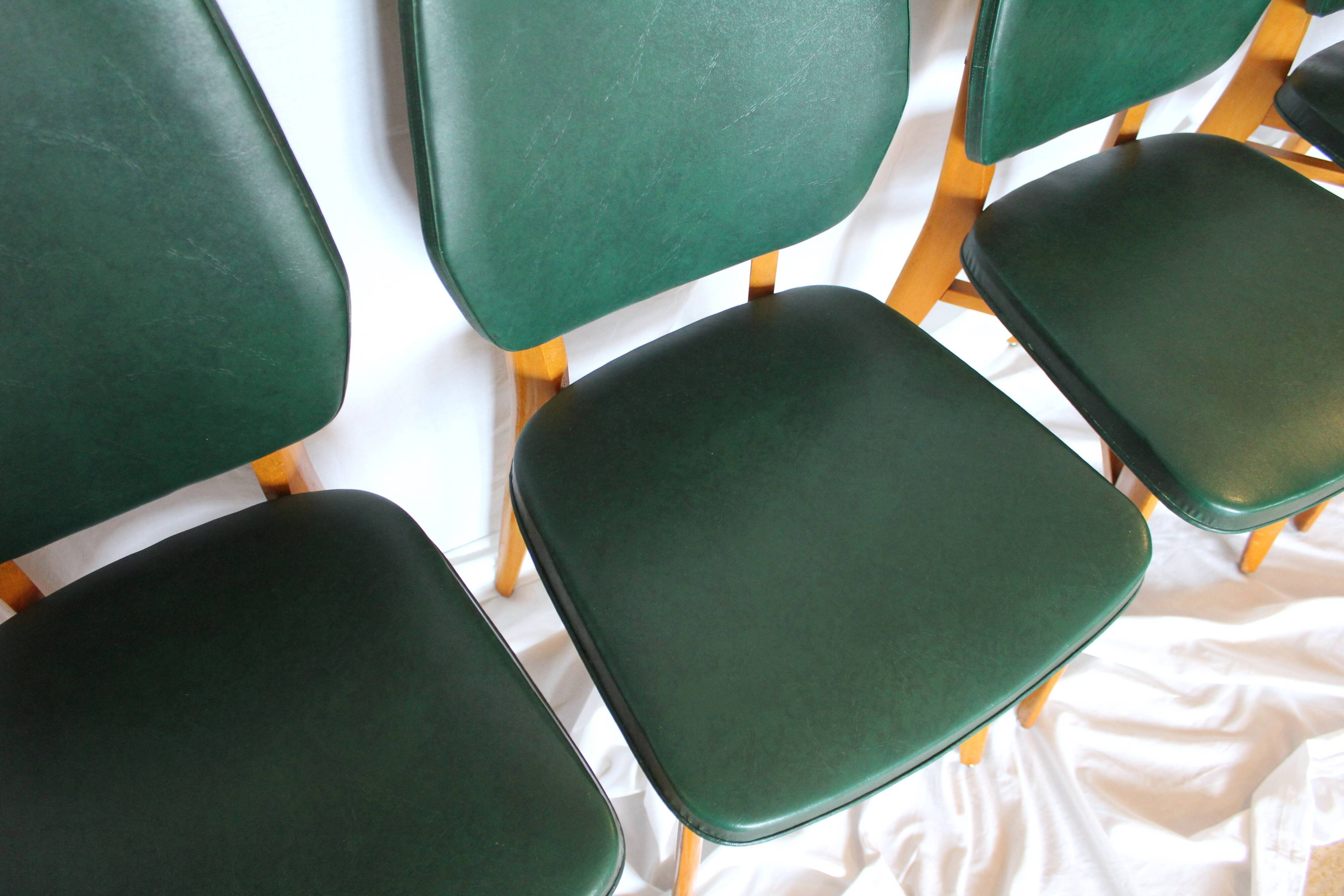 Set of 4 vintage chairs wood and skai green