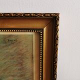 Gilded frame with poster