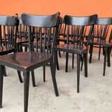 Set of 18 curved wooden bistro chairs with patina from the 60s