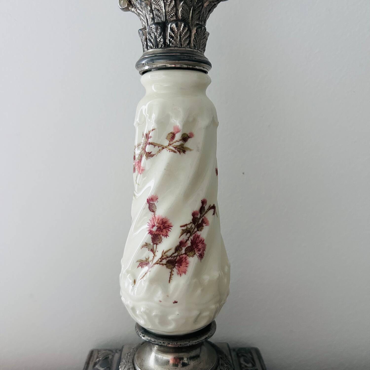 Silver-plated metal and porcelain candlestick