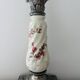 Silver-plated metal and porcelain candlestick