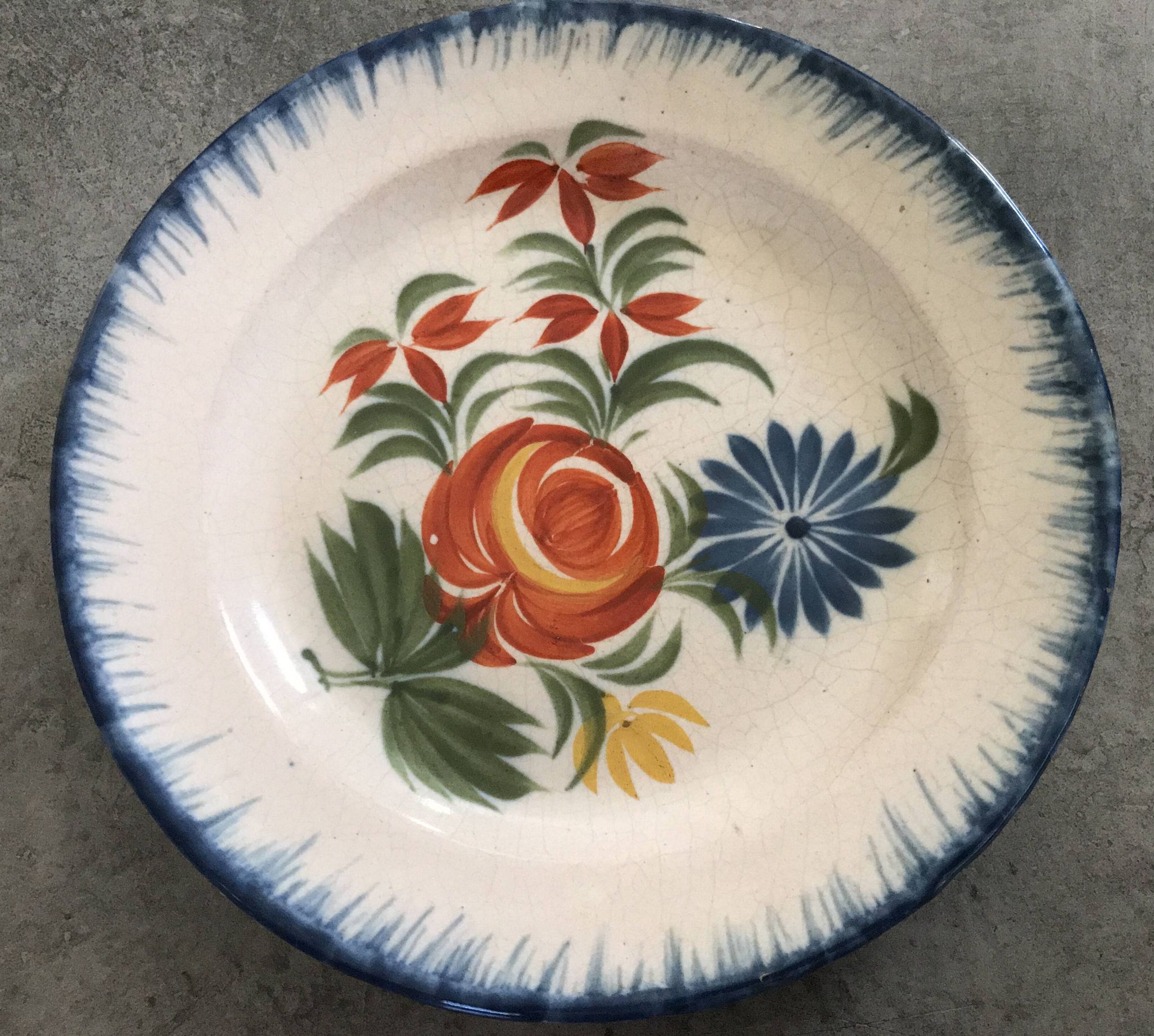 Old plate in auvillar earthenware, floral painting decoration, 19th century