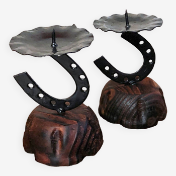 Pair of artisanal horseshoe candlesticks in wood and wrought iron