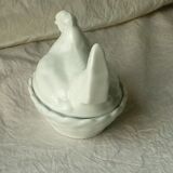 Candy hen on its porcelain nest