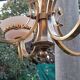 Art Deco chandelier with 4 lights in bronze and opaline.