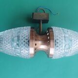 Vintage brass wall sconce with two glass globes