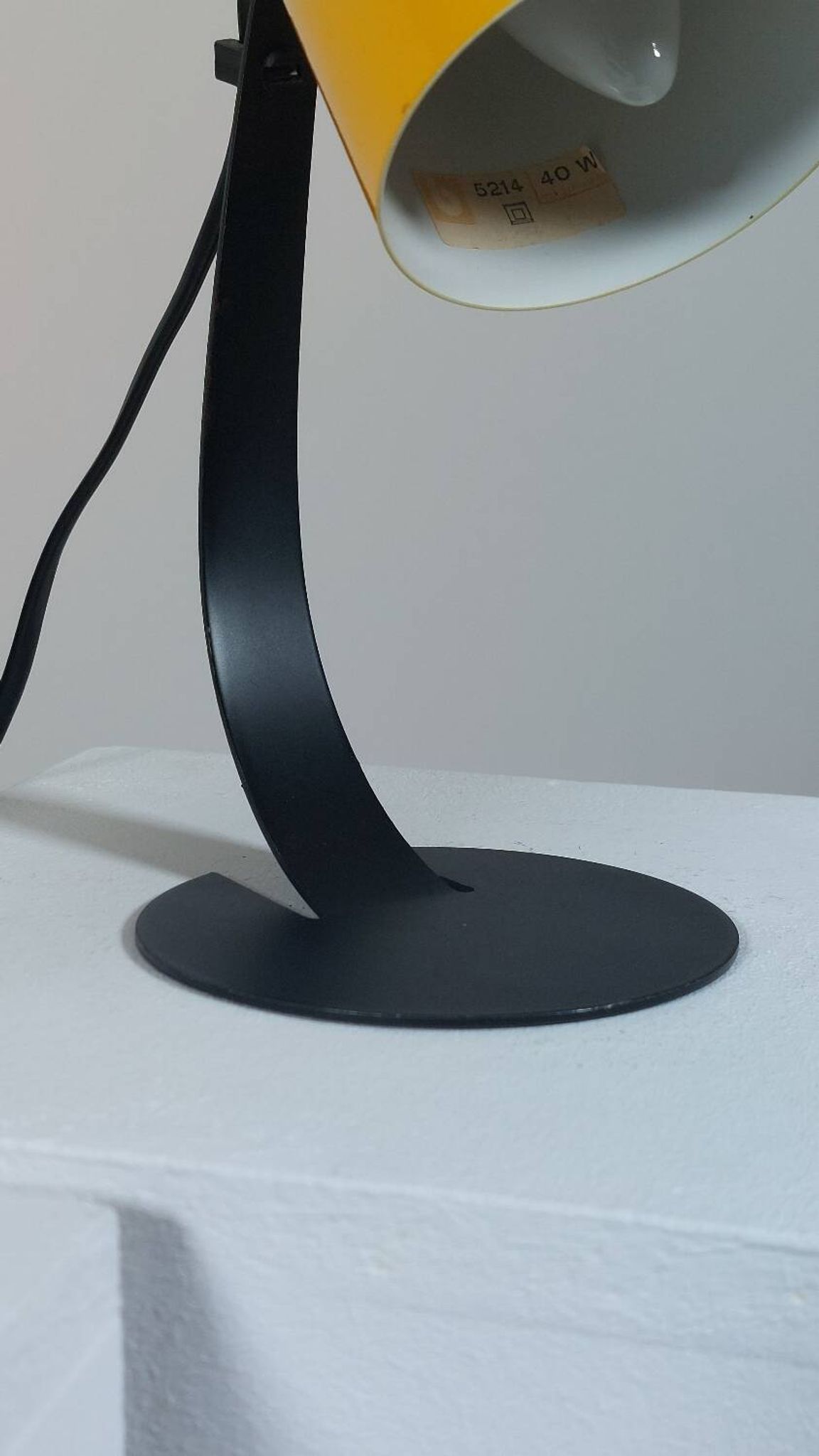 A pair of well-designed minimalist bedside lamps.