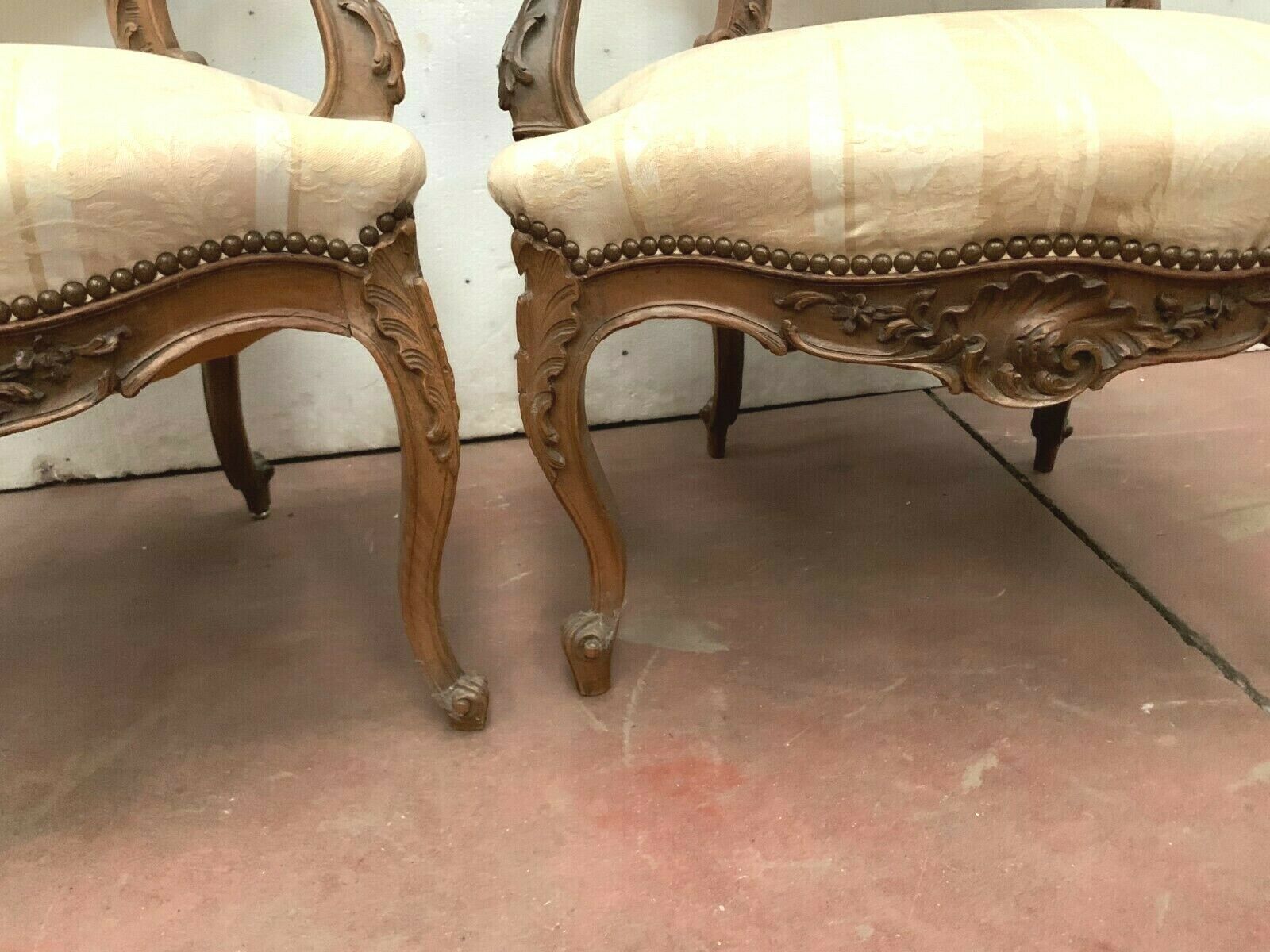 Pair of 20th century walnut rock armchairs